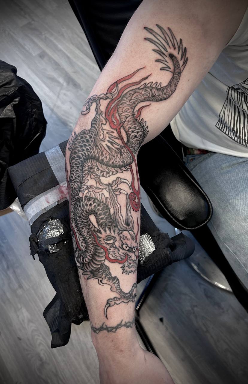 Japanese dragon forearm tattoo