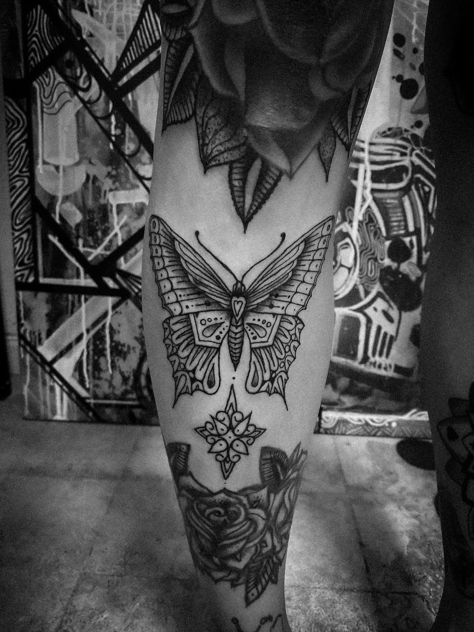 Decorative moth tattoo